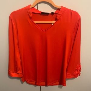 Blood orange woman’s blouse. Size Medium.